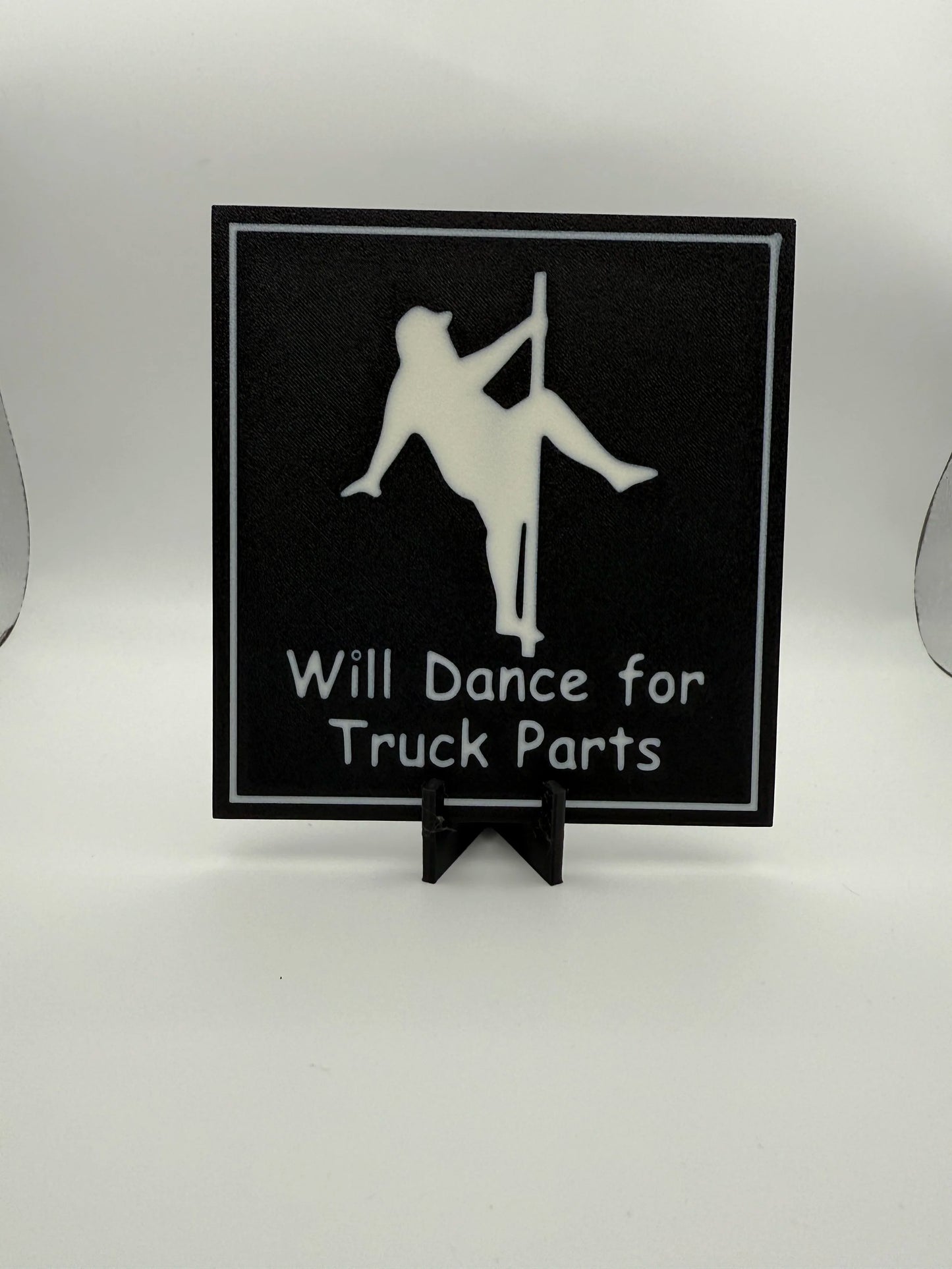 "Will Dance For Truck Parts" Sign