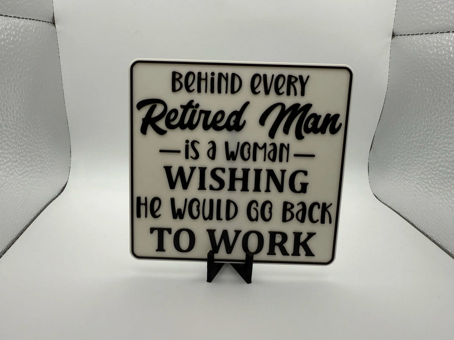 "Behind Every Retired Man" Sign
